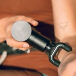 Best Massagers for Home Use Massage Gun Being Used on the Arm